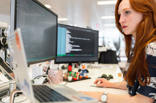 women developer working on code